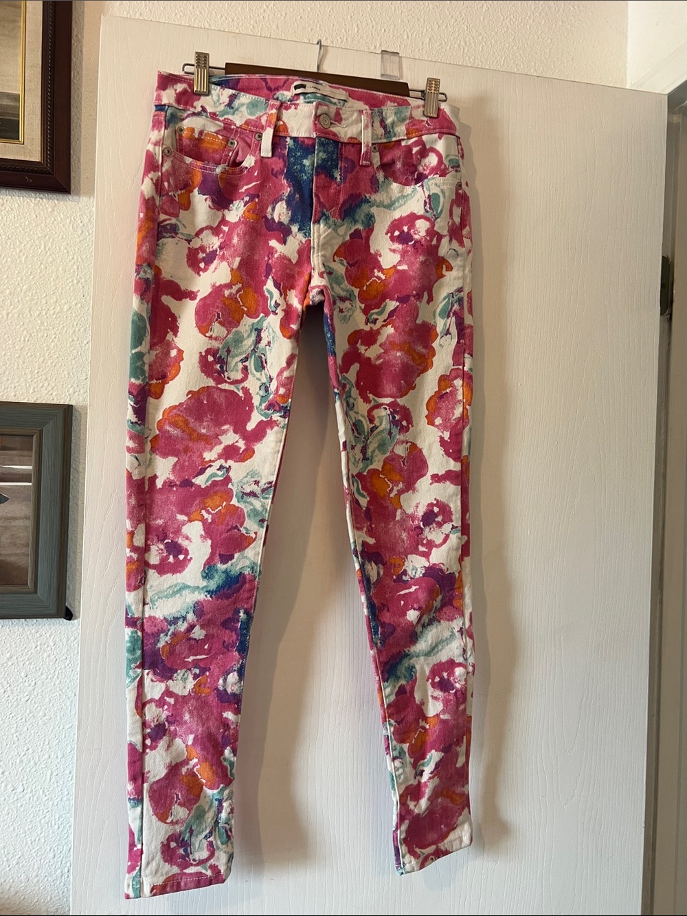 Levi's Floral Watercolor Skinny Jeans in Pink and Teal. Length 30 plus.